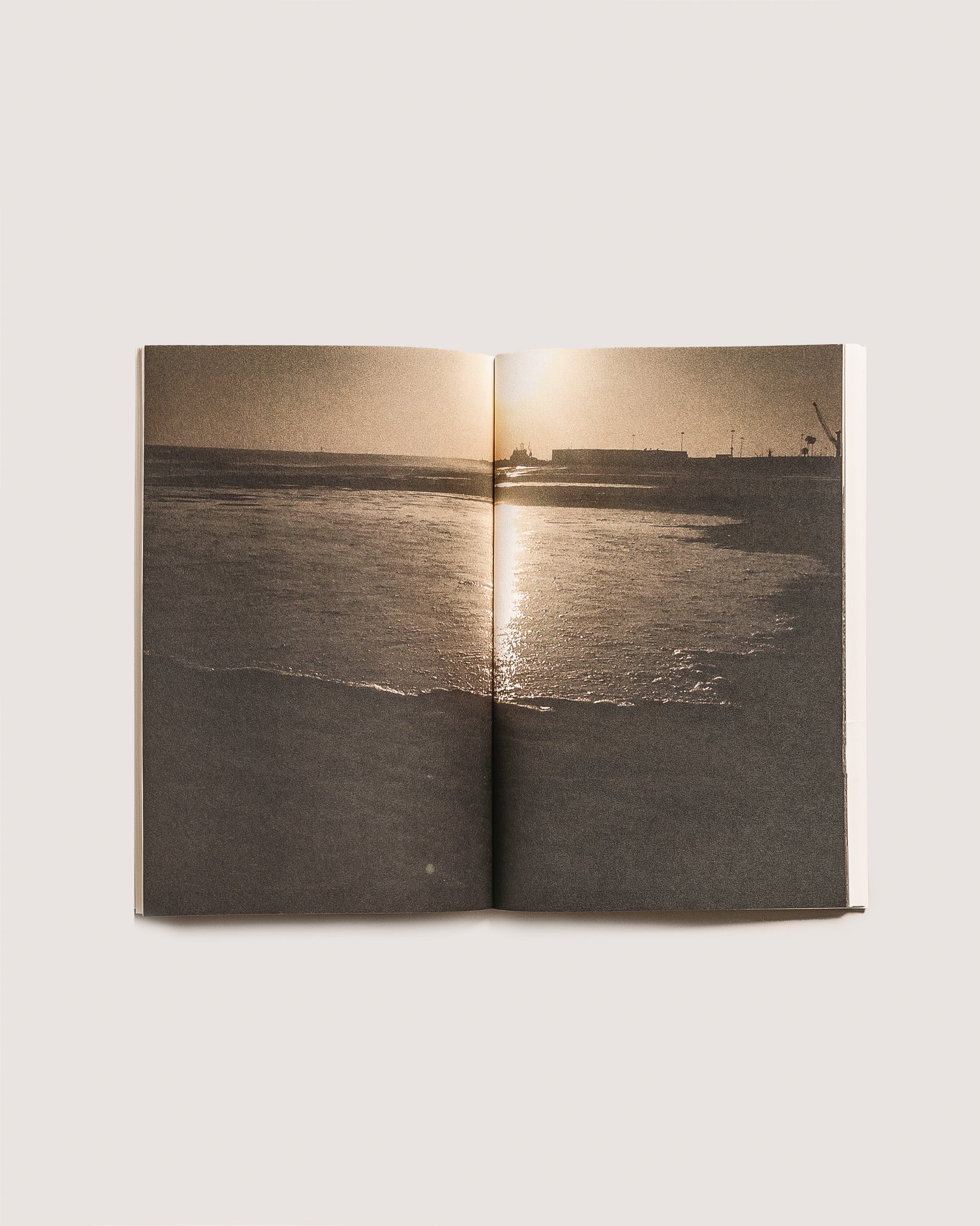 Satta | A book with a hole in it